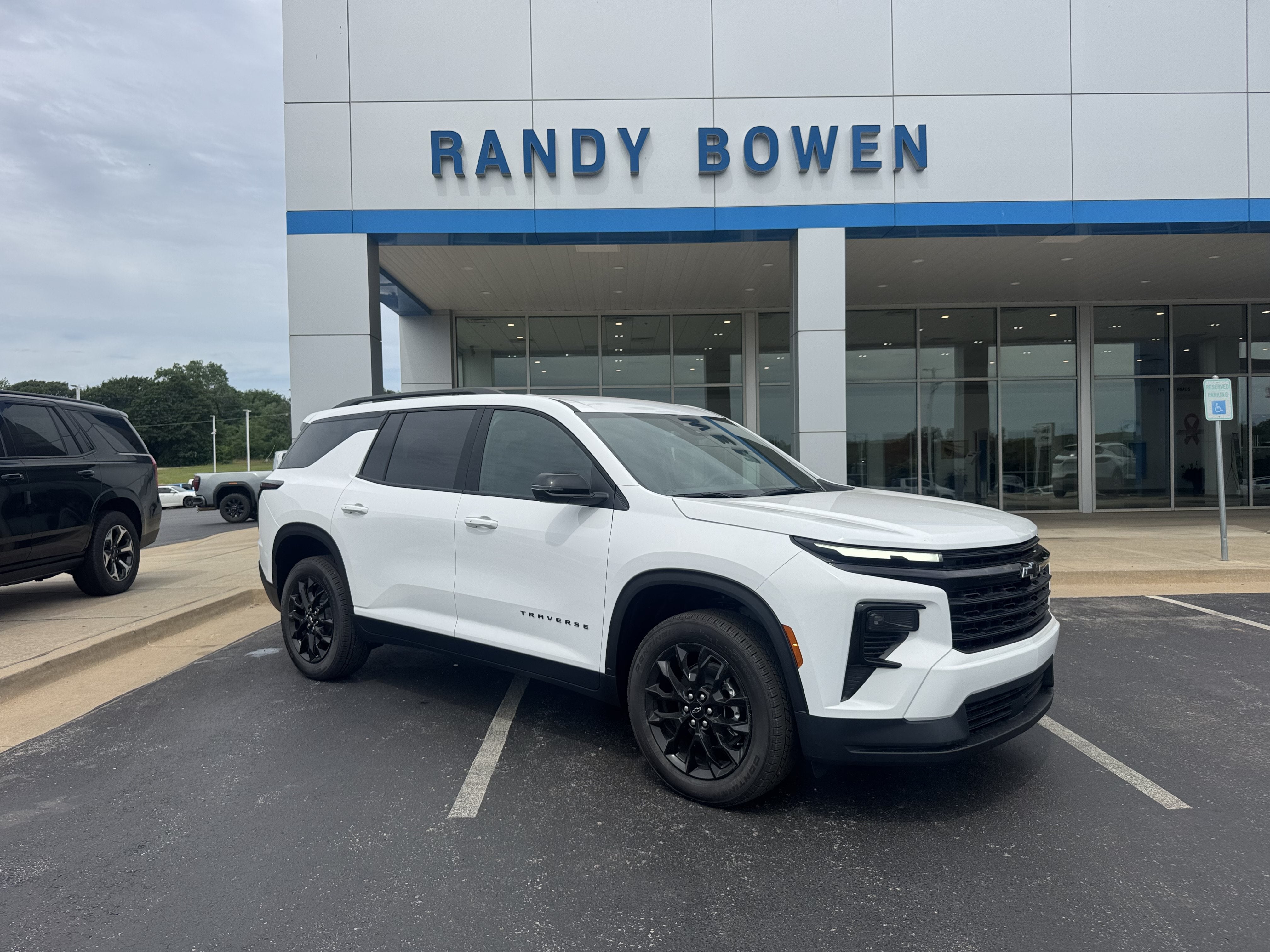 2026 Chevrolet Traverse LT in Summit White — front three-quarter view